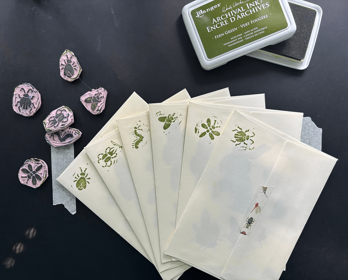 print club letters and decorative hand-carved bug stamps